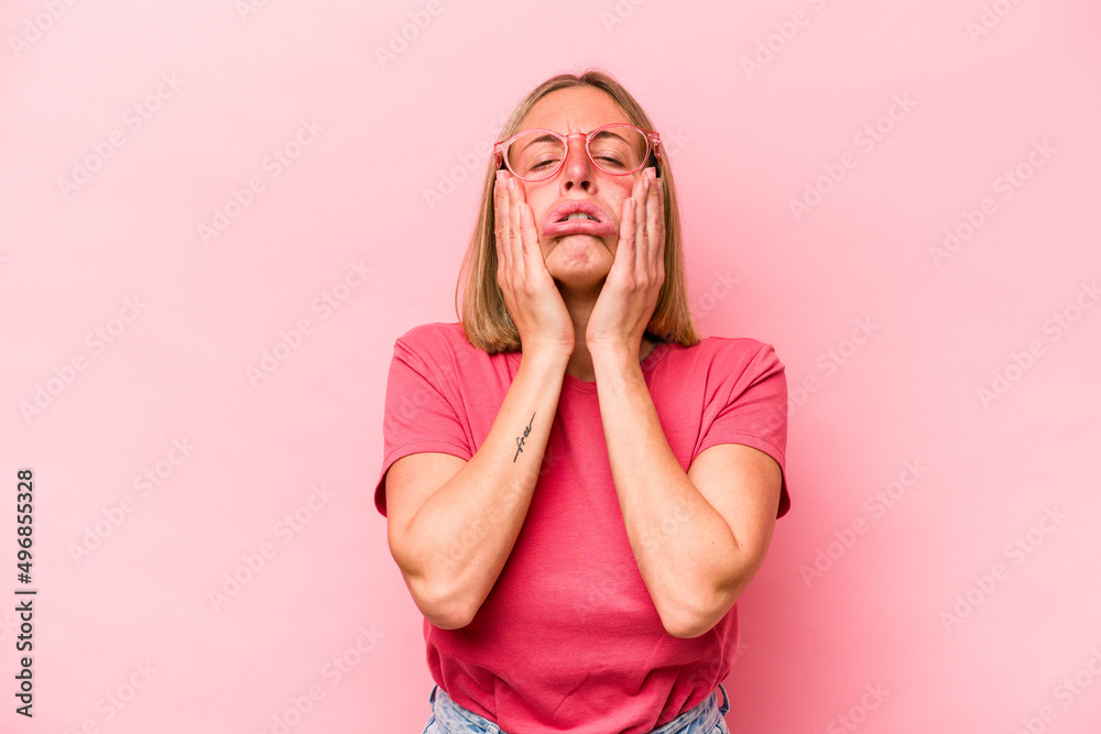 Young caucasian woman isolated on pink background whining and crying disconsolately. Young caucasian woman isolated on pink background whining and crying disconsolately.