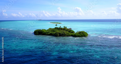 Island in the Maldives under a blue sky photo