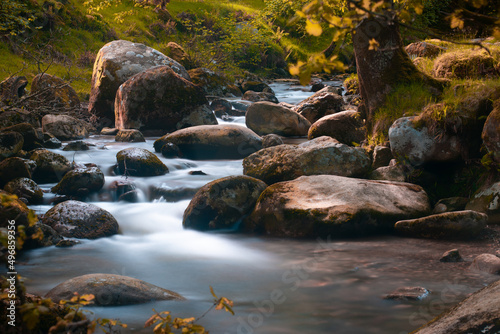 Photography Beautiful view of a river with many rocks in Dublin, Republic of Ireland