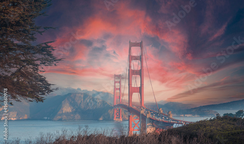 Beautiful view of Golden Gate bridge in background of mountains during sunset