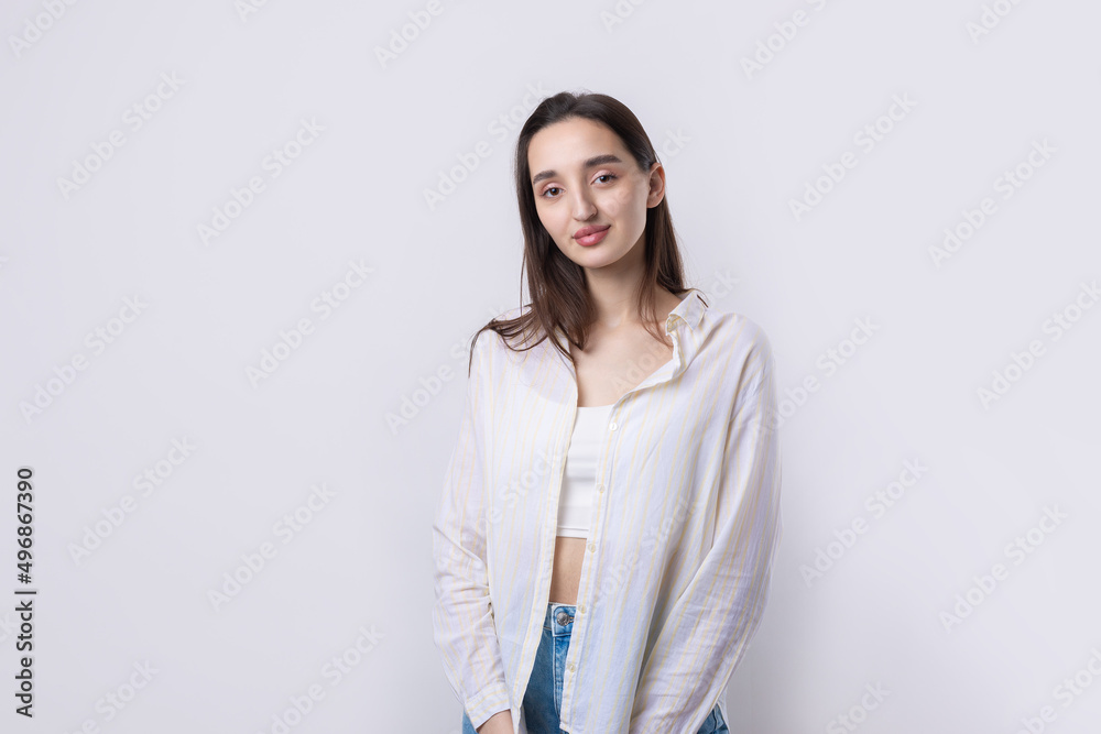 Portrait of a beautiful young woman thinking, isolated on white background Portrait of a beautiful young woman thinking, isolated on white background