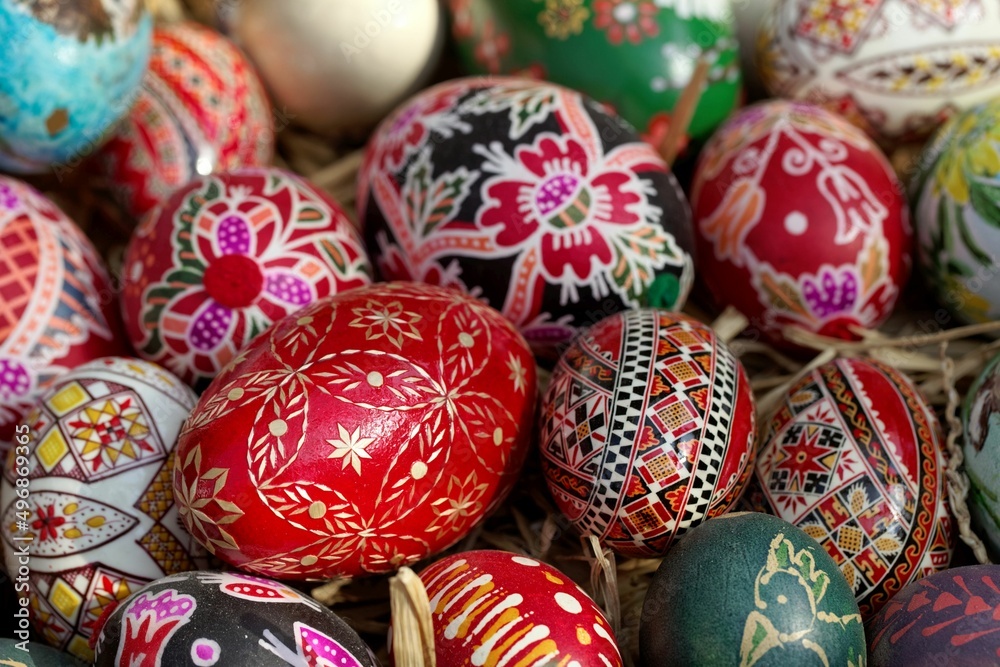 Hand painted Easter eggs with straw Hand painted Easter eggs with straw
