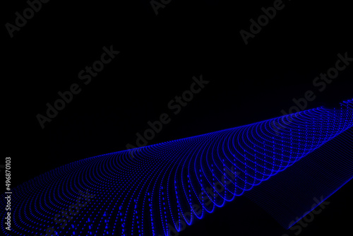 3D illustration or 3D rendering. Blue colored lights forming a curved abstract pattern.