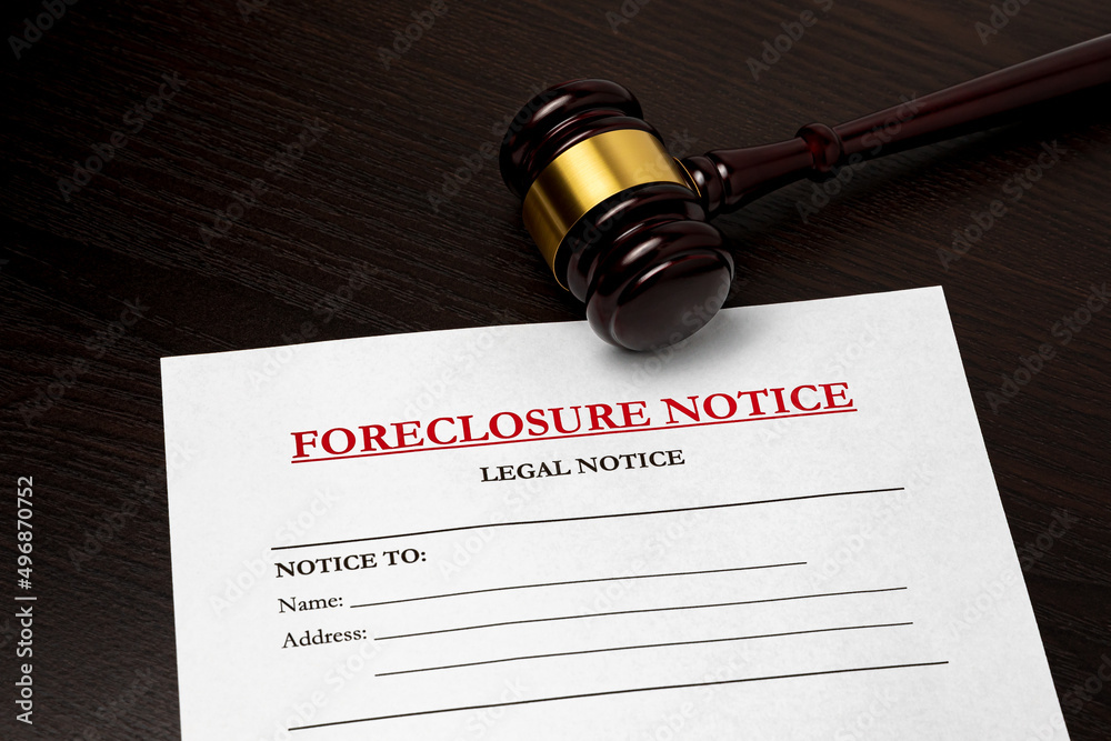 Foreclosure notice and gavel. Housing crisis, loan default and unemployment concept.