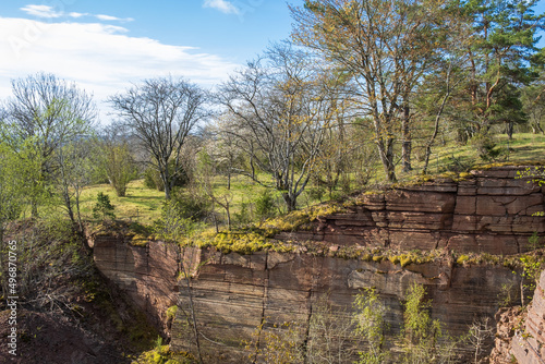 Old abandoned quarry in a beautiful landscape in the spring