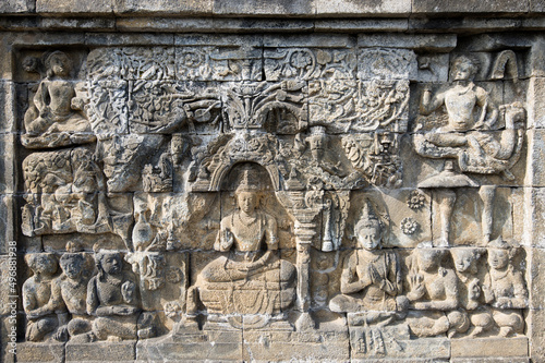 Detail of Buddhist carved relief in Borobudur temple - Java, Indonesia