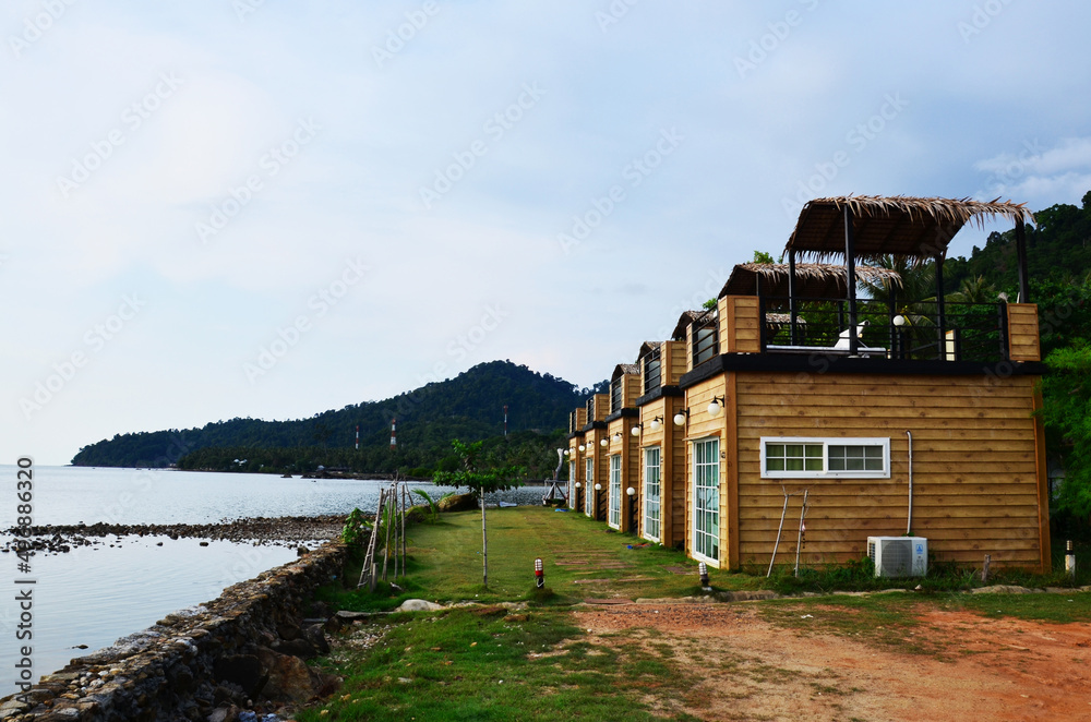 Classic modern vintage building of resort hotel at seaside beach for thai people and foreign travelers guest travel visit and rent rest relax at Koh Chang island in Gulf of Thailand in Trat, Thailand