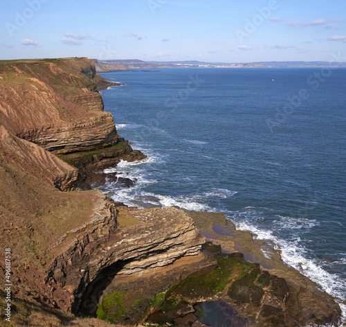 Rugged coastline at Filey Brigg, East Yorkshire, UK photo