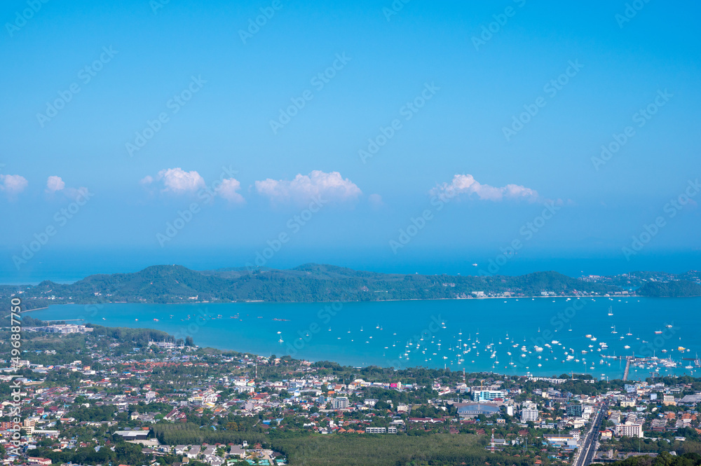 Beautiful turquoise sea and blue sky from high view point at Phuket, Thailand.