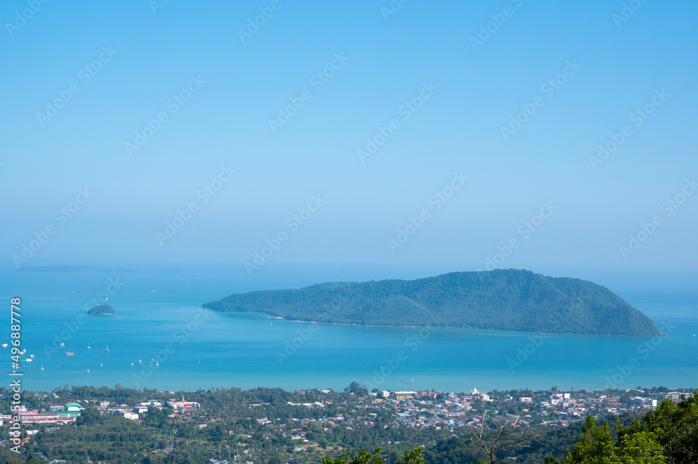 Beautiful turquoise sea and blue sky from high view point at Phuket, Thailand.