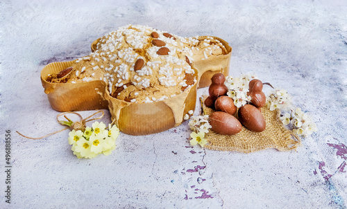 Traditional Italian Easter Dove Bread , Chocolate Easter Eggs and Cherry Blossoms 