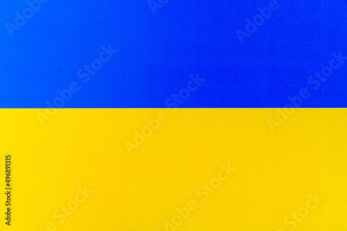 Paper flags of ukraine. Blue and yellow conceptual idea - with Ukraine in his heart. Support for the country during the occupation. Background for protest against war, military conflict