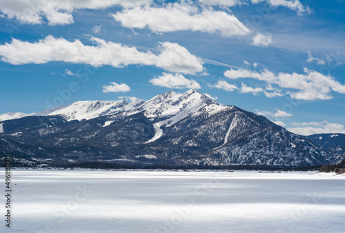 Colorado mountain views over frozen Dillon Lake Reservoir on a bright spring day near Frisco. © Red Rock Photography