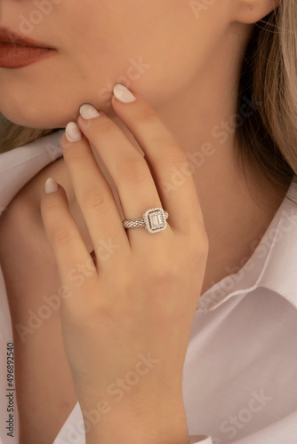 Heart diamond ring  look of a girl wearing beautiful jewelery with precious stones.