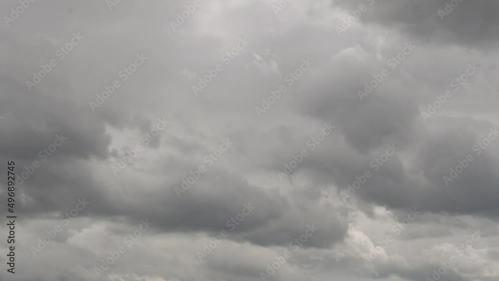 Gloomy Gray Sky Covered with Cumulus Rain Clouds, Timelapse. Bad Rainy Weather on Rainy Day, Climate, Weather Forecast, Cyclone, Meteorology. Gray Cloud and Sad Sky. Gloomy Gray Sky Covered with Cumulus Rain Clouds, Timelapse. Bad Rainy Weather on Rainy Day, Climate, Weather Forecast, Cyclone, Meteorology. Gray Cloud and Sad Sky.