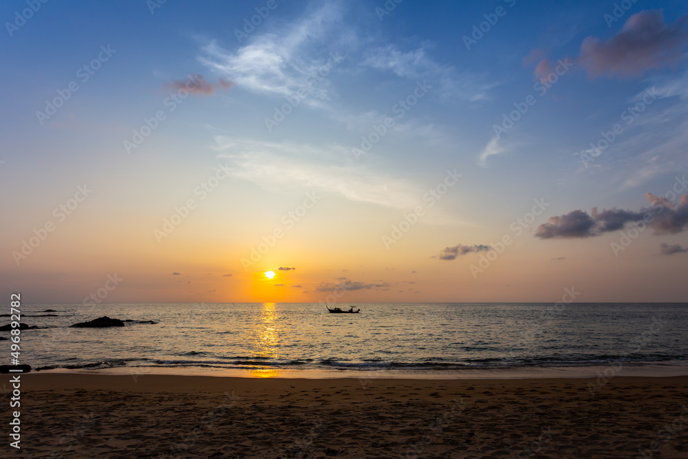 Sunset sea landscape, Beautiful sea view at sunset with colorful clouds and longtail boats on the sea.