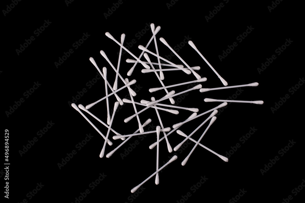 Cotton buds isolated on black background. Cotton buds isolated on black background.