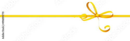 Foto yellow colored ribbon bow