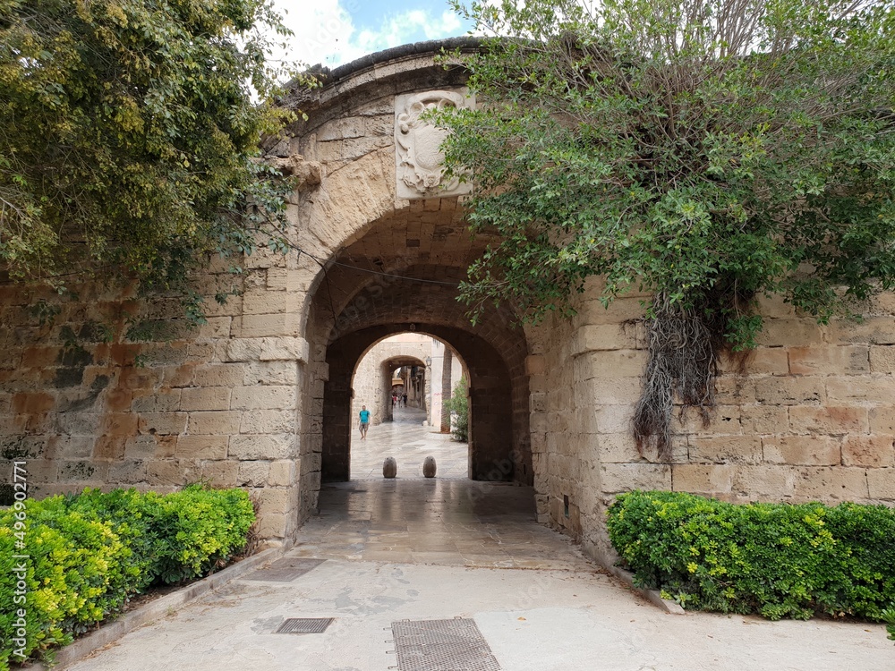 Passageway from the sea-side parc de la mar in front of the city walls to the old town of Palma, Mallorca, Balearic Islands, Spain