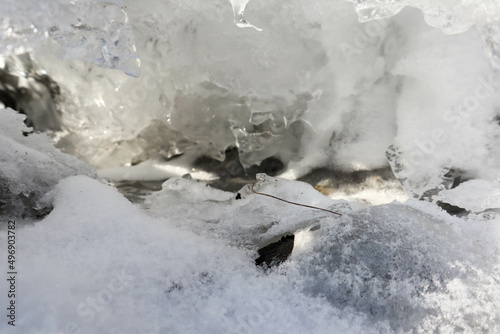 spring melting ice on the rocks of Ladoga lake