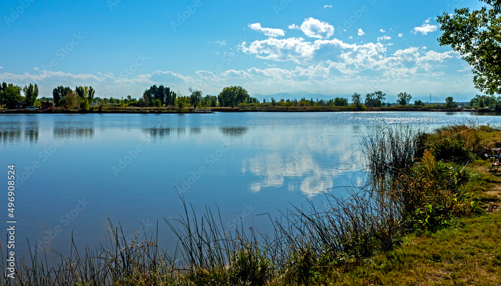 Reflection of clouds in the water lake, Colorado.