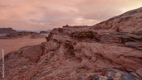 Rocky scenery in Wadi Rum desert during overcast morning