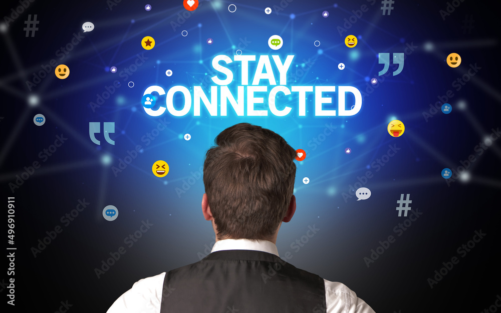 Rear view of a businessman, social media concept Rear view of a businessman, social media concept