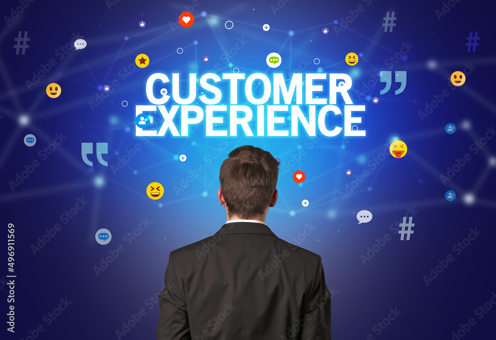 Rear view of a businessman, social media concept Rear view of a businessman, social media concept