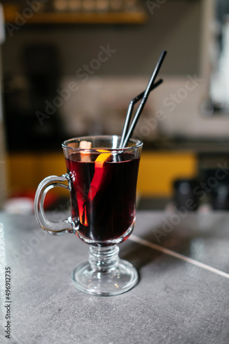 Mulled wine on a table in a cafe. Warming drink.