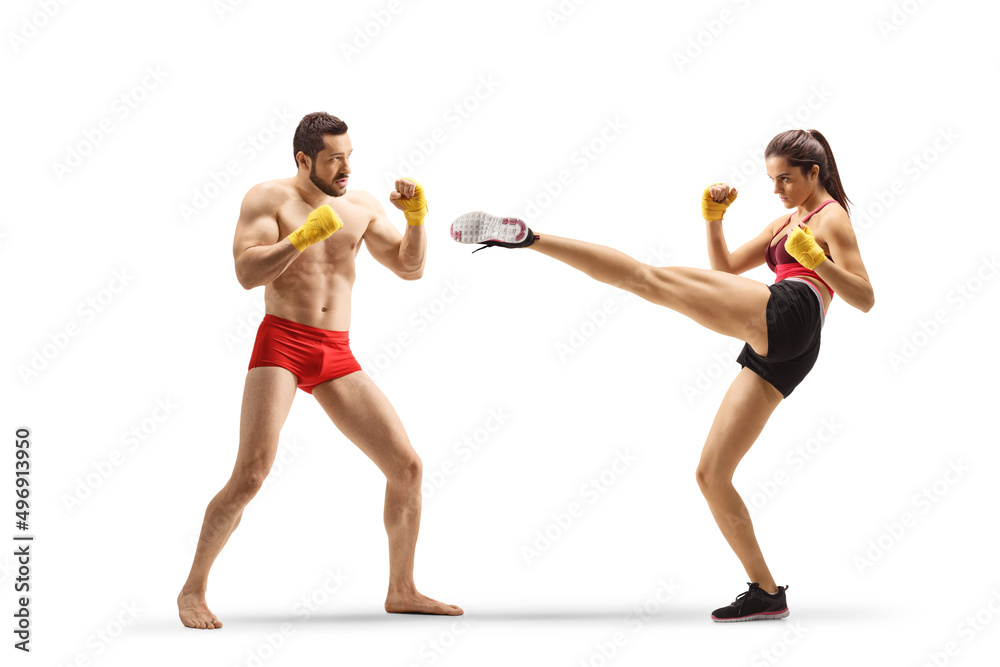 Male and female athlets exercising kick boxing - obrazy, fototapety, plakaty 