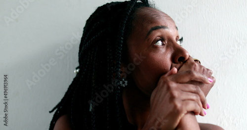 Fotografía Mixed race woman feeling anxiety and worry