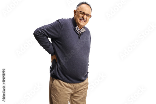 Casual mature man in pain holding his back