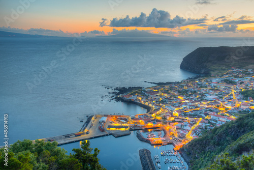 Sunset view of Velas town at Sao Jorge island in Portugal photo