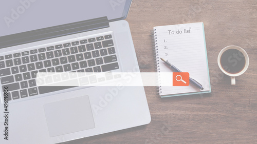 Search tag over with To Do List text on book note with cup of coffee, pen and smartphone.