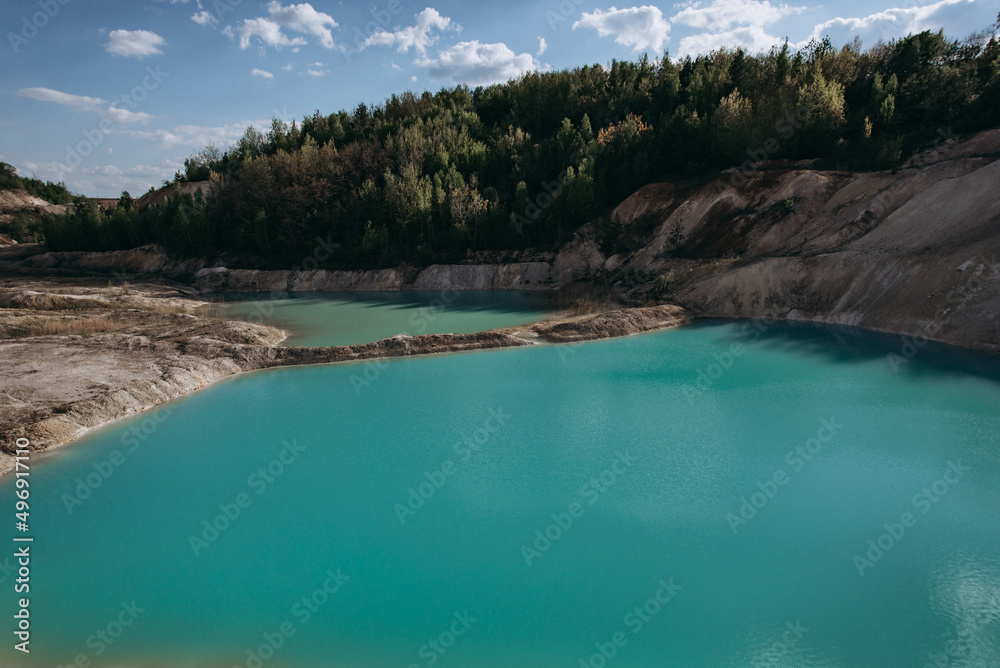 Quarry and golden beach with beautiful blue, turquoise water. Ukraine. concept, vacation, travel, nature and landscape