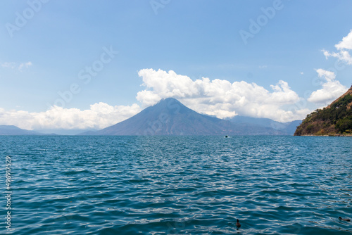 view of lake atitlan and volcano from the village of santa cruz la laguna, guatemala