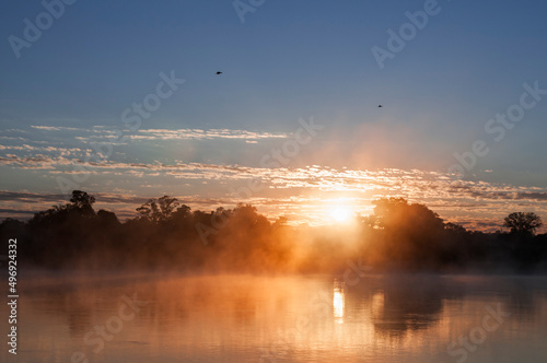 Sunrise at the Okavango River / Sunrise at the Okavango River, Namibia ,Southern Africa. photo