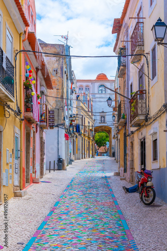 Narrow street of the old town at Portuguese town Setubal photo