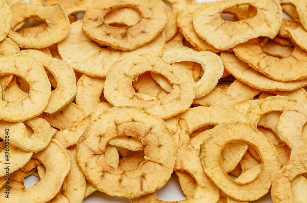 Apple chips. Background of dried fruits. Healthy and tasty food.