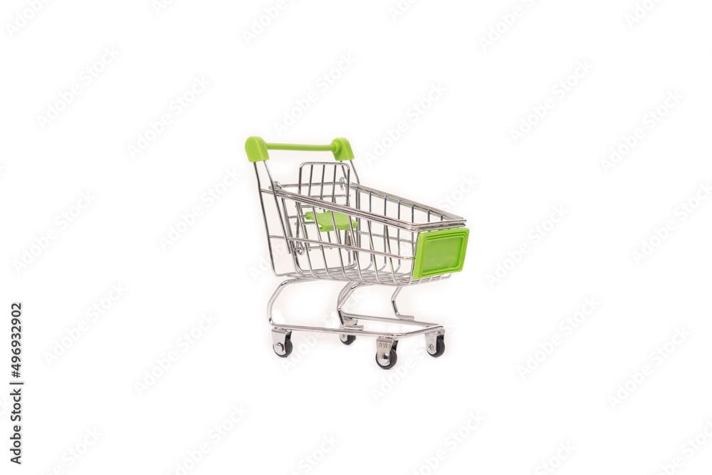 Photo of a metal trolley for shopping in a grocery store isolated on white background with free space for text. Shop concept