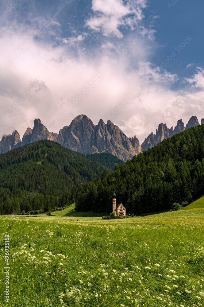 Italy, South Tyrol, Scenic view of Church of Saint John in Ranui with Gruppo delle Odle in background.