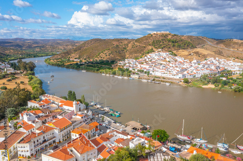 Spanish town Sanlucar de Guadiana viewed from Portuguese town Alcoutim photo