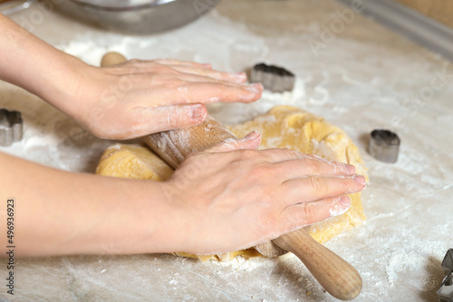 Dough in hands, making cookies