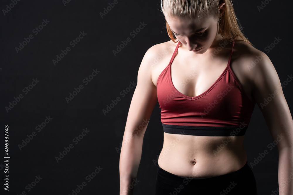 Down uniform a the in girl looks girl sports dumbbells pres fitness body, for female fit from person for training strength, strong wellness. Care model bodybuilder, empty space