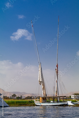Traditional Egyptian felucca boats moored on the banks of the Nile, Egypt
