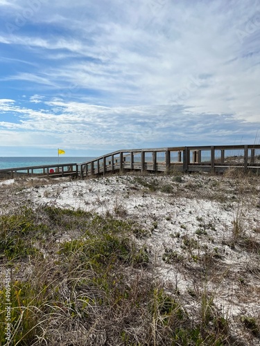 Fototapeta Naklejka Na Ścianę i Meble -  Upper view of dunes and walkway at Henderson Beach State Park Florida 