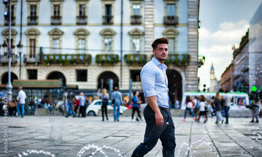One handsome elegant man in city setting wearing shirt