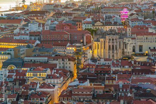 Sunset view of cityscape of Lisbon with Santa Justa lift, Portugal photo