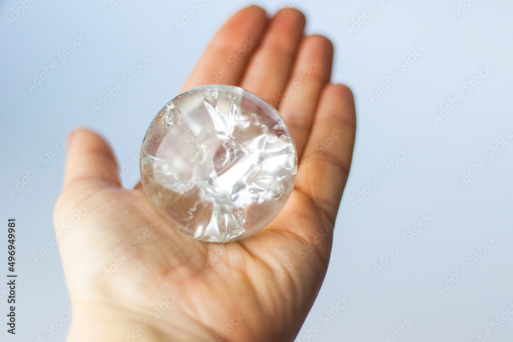 A crystal ball in the palm of your hand. A crystal ball in the palm of your hand.