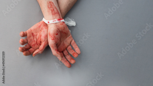 Εκτύπωση καμβά Bound bloody male hands on a gray background
